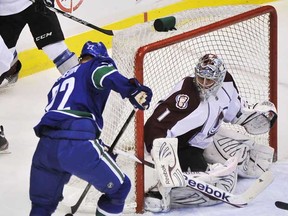 Daniel Sedin moves in on Semyon Varlamov during the Canucks' 6-0 win on Tuesday night. (Ian Lindsay/PNG)