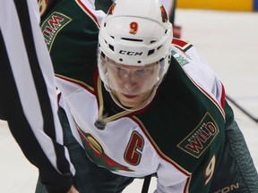 WINNIPEG — Wild captain Mikko Koivu prepares to take a draw against the Jets. He won't be doing the same tonight against the Vancouver Canucks. The centre is out with a leg injury. (Getty Images/via National Hockey League).