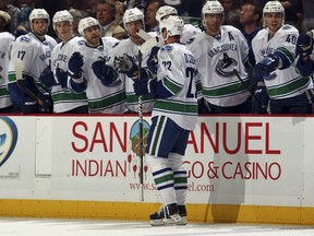 Bruce Boudreau loves watching the Sedins play, but goal celebrations not so much.