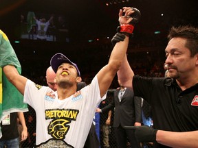 RIO DE JANEIRO, BRAZIL - JANUARY 14:  Jose Aldo (L) celebrates after defeating Chad Mendes in a featherweight bout during UFC 142 at HSBC Arena on January 14, 2012 in Rio de Janeiro, Brazil.  (Photo by Josh Hedges/Zuffa LLC/Zuffa LLC via Getty Images)