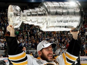 VANCOUVER — Mark Recchi does a Rogers Arena victory lap on June 15 after the Boston Bruins won the Stanley Cup with a 4-0 triumph in Game 7. (Photo by Dave Sandford/NHLI via Getty Images)