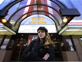 Corrine Lea stands in front of the Rio Theatre on East Broadway in Vancouver that can no longer show movies after getting a liquor licence. (Mark van Manen/ PNG FILES)