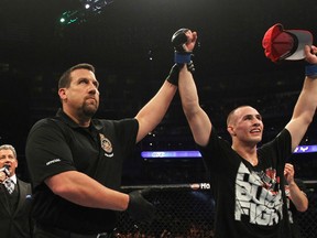 British Columbia native Rory MacDonald has his arm raised in victory after beating Nathan Diaz at UFC 129 in Toronto on April 30, 2011. (photo courtesy of Zuffa LLC)