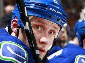 VANCOUVER — Sami Salo checks out the on-ice action in a Jan. 4 game against Minnesota at Rogers Arena. He suffered a concussion three days later in Boston and returns tonight against Edmonton. (Photo by Jeff Vinnick/NHLI/Vancouver Canucks).