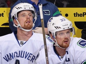 GLENDALE, Ariz. — Daniel and Henrik Sedin keep an eye on the Coyotes in a Nov. 25 game. They join Alex Edler in the All-Star Game on Jan. 29. Cody Hodgson will compete in the skills show. (Getty Images/via National Hockey League).