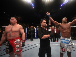 photo 138 of 219
LAS VEGAS, NV - DECEMBER 30: Alistair Overeem (right) is declared the winner in his fight over Brock Lesnar (left) during the UFC 141 event at the MGM Grand Garden Arena on December 30, 2011 in Las Vegas, Nevada. (Photo by Donald Miralle/Zuffa LLC/Zuffa LLC via Getty Images)
