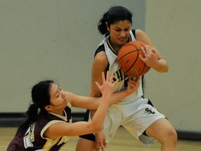 Steveston-London's Anmol Mattu (right) is a towering force on the floor despite her size. (Ric Ernst, PNG)