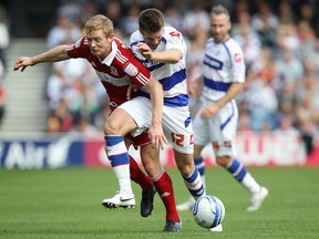 Barry Robson of Middlesbrough battles with Jamie Mackie of Queens Park Rangers during an npower Championship match at Loftus Road. (Photo by Jan Kruger/Getty Images)