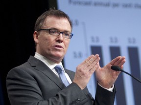 Finance Minister Kevin Falcon presents British Columbia's 2012 budget to journalists in the media lockup at the Victoria Conference Centre before delivering the budget in the legislature. (Adrian Lam/TIMES COLONIST)