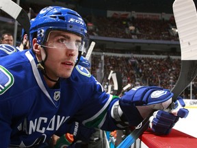 VANCOUVER — Alex Burrows watches play Jan. 24 against Edmonton at Rogers Arena. The Canucks winger is proving he should be on the ice for shootouts. (Photo by Jeff Vinnick/Getty Images/via National Hockey League.