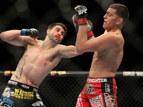 photo 133 of 151
LAS VEGAS - FEBRUARY 04: Carlos Condit (left) punches Nick Diaz during the UFC 143 event at Mandalay Bay Events Center on February 4, 2012 in Las Vegas, Nevada. (Photo by Josh Hedges/Zuffa LLC/Zuffa LLC via Getty Images)