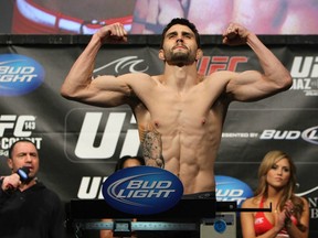 &amplt;&ampgt; weighs in during the UFC 143 official weigh in at Mandalay Bay Events Center on February 3, 2012 in Las Vegas, Nevada.|2:55:8