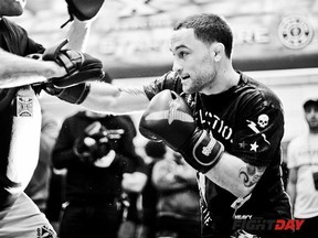 UFC lightweight champion Frankie Edgar goes through the paces at the UFC 144 Open Workouts in Tokyo, Japan. (photo courtesy of James Law/HeavyMMA)