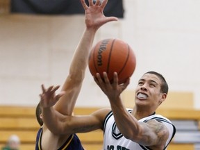 UFV's Joel Friesen was the man of the moment Saturday, his heart-stopping, buzzer-beating trey sending hometown UFV to the conference Final Four. (Tree Frog Imaging)