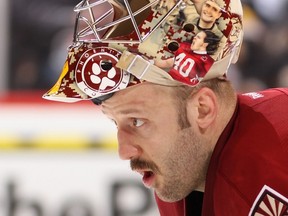 GLENDALE, Ariz. — Phoenix Coyotes goalie Jason LaBarbera takes a break during a Dec. 28 overtime loss to Boston. Tonight, the former Vancouver backup will get the call at Rogers Arena. (Getty Images/via National Hockey League).