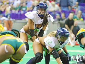 Angela Rypien, daughter of former NFLer Mark, plays quarterback for the Seattle Mist of the Lingerie Football League in this undated photo. (PNG FILES)