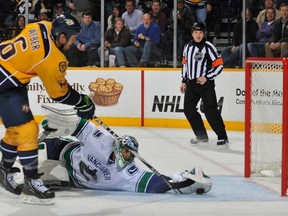 Vancouver Canucks goalie Roberto Luongo stopped all-star Nashville defenceman Shea Weber here on Feb. 21, 2012. Luongo stopped 25 of 28 shots in the Canucks' 3-1 loss. Getty Images photo.