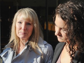 Judith Hutchinson, mother of victim, Orion Hutchinson, left, and his sister Daria Hutchinson speak to reporters Feb. 13 outside the trial of Cpl. Benjamin "Monty" Robinson at New Westminster Law Courts on a charge of obstructing justice in connection with the October 2008 crash that killed motorcyclist Orion Hutchinson in Delta. (Glenn Baglo/PNG FILES)