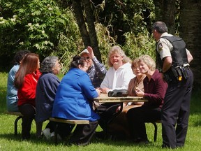 Members of a 2002 native sentencing circle dealing with a criminal case of bullying break for lunch. (David Clark/PNG FILES)