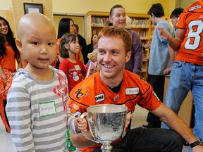 Visits like one to B.C. Childrens Hospital are commonplace for Travis Lulay