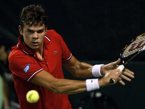 Milos Raonic in Davis Cup action against Israel's Amir Weintraub. (JACK GUEZ/AFP/Getty Images)