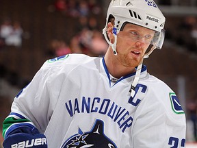 Henrik Sedin #33 of the Vancouver Canucks warms up prior to facing the Colorado Avalanche at the Pepsi Center on February 4, 2012 in Denver, Colorado. The Canucks defeated the Avalanche 3-2 in an overtime shoot out.