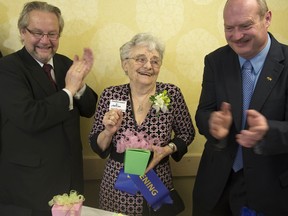 Harry Bloy (left) and Health Minister Mike de Jong join Sally Currie in June  during the opening of Burnaby's Harmony Court Care Centre, a facility for medically stable and independently mobile seniors with dementia. (Ward Perrin/PNG FILES)