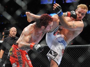 PORTLAND, OR - AUGUST 29: UFC fighter Chris Leben (L) battles UFC fighter Jake Rosholt (R) during their Middleweight bout at UFC 102: Couture vs. Nogueira at the Rose Garden Arena on August 29, 2009 in Portland, Oregon. (Photo by Jon Kopaloff/Getty Images)