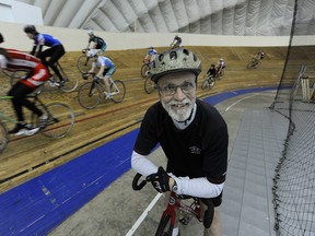 Teacher Russ Simpson of  Langley's Walnut Grove Secondary School mountain biking club trains students at the velodrome in North Burnaby on Jan. 9, when many students got their first chance to try out the indoor track. (Mark van Manen/PNG FILES)