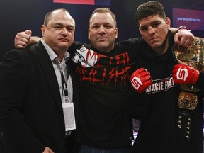 Cesar Gracie (center) poses with Strikeforce president Scott Coker and Nick Diaz.