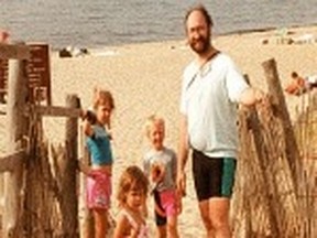 My sister, brother and I with my Dad.