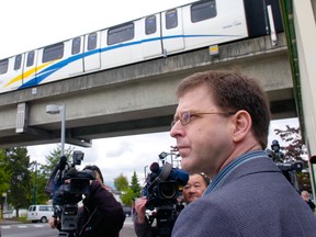 Adrian Dix and volunteers gather signatures at the Nanaimo SkyTrain station in 2007 on his petition to improve safety on the system. (Les Baszo/PNG FILES)