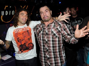 LAS VEGAS - JULY 03: Mixed martial artist Clay Guida (L) and actor, comedian and Ultimate Fighting Championship color commentator Joe Rogan joke around at the official Silver Star Casting Co. pre-party for UFC 116 at Studio 54 inside the MGM Grand Hotel/Casino early July 3, 2010 in Las Vegas, Nevada. (Photo by Ethan Miller/Getty Images for MGM Resorts International)