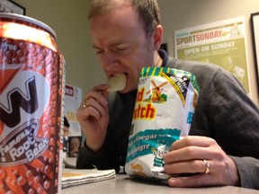 Province Sports editor Jonathan McDonald takes solace from the the realities of life in a bag of chips and some root beer.