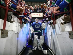Vancouver Canucks goalie Cory Schneider emerges from the tunnel before beating the Winnipeg Jets 3-2 on March 8, 2012 at Rogers Arena. Getty Images photo.