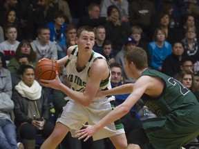 Fraser Valley MVP Trevor Severinski is closely guarded by Walnut Grove's Paul Getz during Saturday's final at a packed Langley Events Centre, (Ron Hole, Pitt Meadows athletics)