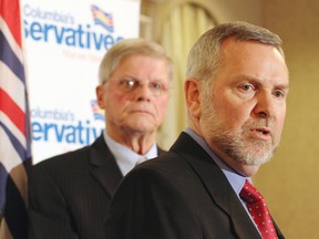 Former Liberal MLA John van Dongen and John Cummins, leader of the B.C. Conservative Party, address the media at the Hotel Grand Pacific in Victoria concerning van Dongen's decision Monday to resigned from the B.C. Liberal caucus, citing a lack of integrity in the party. (TIMES COLONIST FILES)