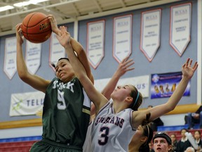 York House forward Carmalita Robertson (left) and Claremont guard Sam Lee battle for a rebounding during Final 8 action Thursday in North Vancouver. (Les Bazso, PNG)