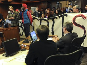Some 50 protesters opposed to a development in the Downtown Eastside took over the council chambers at Vancouver city hall on Tuesday. (Jason Payne/PNG FILES)