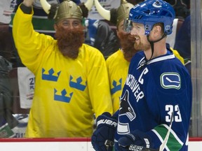 What's Swedish for "Get your ass in gear, Hank?" These guys were at Game 1 of the Canucks-Kings series. Getty Images photo.
