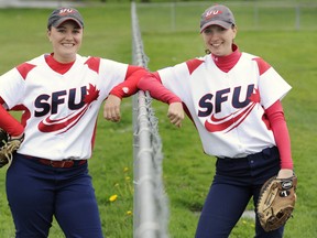 SFU's Kelsey Haberl (left) and Brittany Ribeiro are softball sisters with the rarest of dugout stories to tell. (Gerry Kahrmann, PNG)