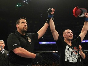 Kelowna's Rory MacDonald raises his arms in victory at UFC 129 in Toronto. The promising welterweight prospect hopes to be able to do the same in Vancouver in the future. (photo courtesy of Zuffa LLC / Zuffa LLC via Getty Images)