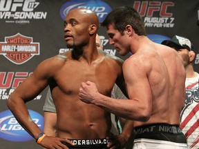 OAKLAND, CA - AUGUST 06:  (L-R) UFC Middleweight Champion Anderson Silva refuses to face off with opponent Chael Sonnen at the UFC 117 weigh-in at Oracle Arena on August 6, 2010 in Oakland, California.  (Photo by Josh Hedges/Zuffa LLC/Zuffa LLC via Getty Images)