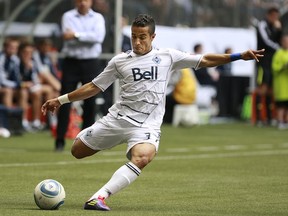 VANCOUVER, CANADA - OCTOBER 2:  Camilo Sanvezzo #37 of the Vancouver Whitecaps FC kicks the ball during their MLS game against the Portland Timbers October 2, 2011 at BC Place in Vancouver, British Columbia, Canada.  Portland won 1-0. (Photo by Jeff Vinnick/Getty Images)