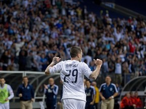 This guyyyyy. Eric Hassli celebrates his stunning volley in the first leg against TFC. (Rich Lam/Getty Images)