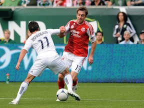 Whitecaps' John Thorrington made the MLS team of the week on Tuesday. (Steve Dykes/Getty Images)