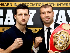 NOTTINGHAM, ENGLAND - MARCH 19:  Carl Froch (L) and Lucian Bute during a press conference to promote their Super Middleweight bout on Saturday May 26th at Nottingham Capital FM Arena on March 19, 2012 in Nottingham, England.  (Photo by Scott Heavey/Getty Images)
