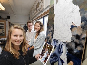 Artist Rachel Woldmo and her work-in-progress, a mural of the late basketball star Quinn Keast. Organizer Jaime Hills and student council president Eric Warner look on. (PNG photo)