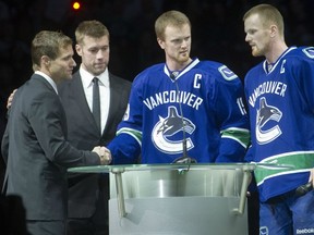 Mattias Ohlund (second from left), deserves a place of honour at Rogers Arena beside Markus Naslund (number retired) and the Sedins (numbers to be retired).