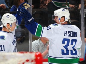 Mason Raymond celebrates his second goal in two games in March after being moved up on Henrik Sedin's wing following Daniel Sedin's concussion. Alas for the player and the Canucks, Raymond didn't score again in the 11 remaining games, including five postseason games.